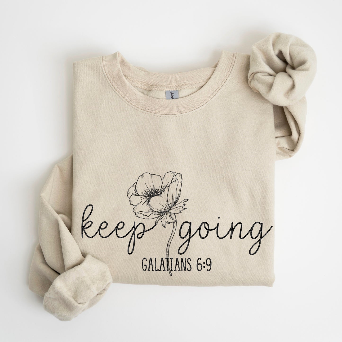 Keep Going Black Font DTF Transfer